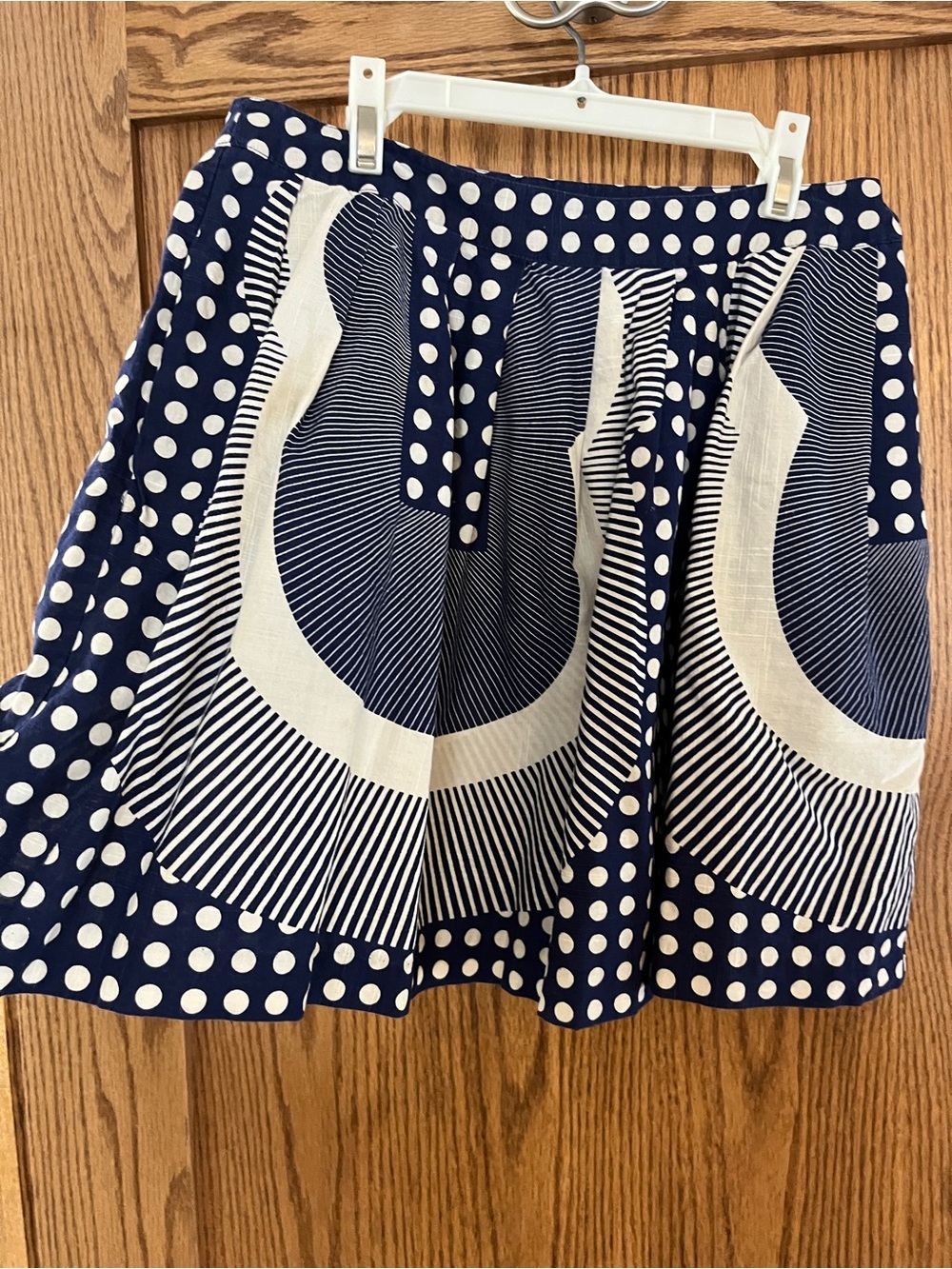 Cooperative Women's Navy and White Polka Dot miniskirt.